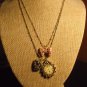 Beautiful Multi Charm Brasstone Clock Necklace 18-20 Inch NWOT