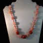 Beautiful handmade orange sherbet coral necklace