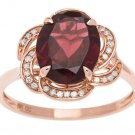 Rose Gold 3.16ct Oval Garnet and Pave Curved Halo Diamond Ring