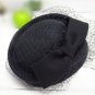 100% wool Lady/woman' s pillbox hat, with large wool bow & netting, one-size-fits-all