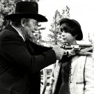 JOHN WAYNE AND KIM DARBY IN THE FILM "TRUE GRIT" - 8X10 PUBLICITY PHOTO (DD-143)