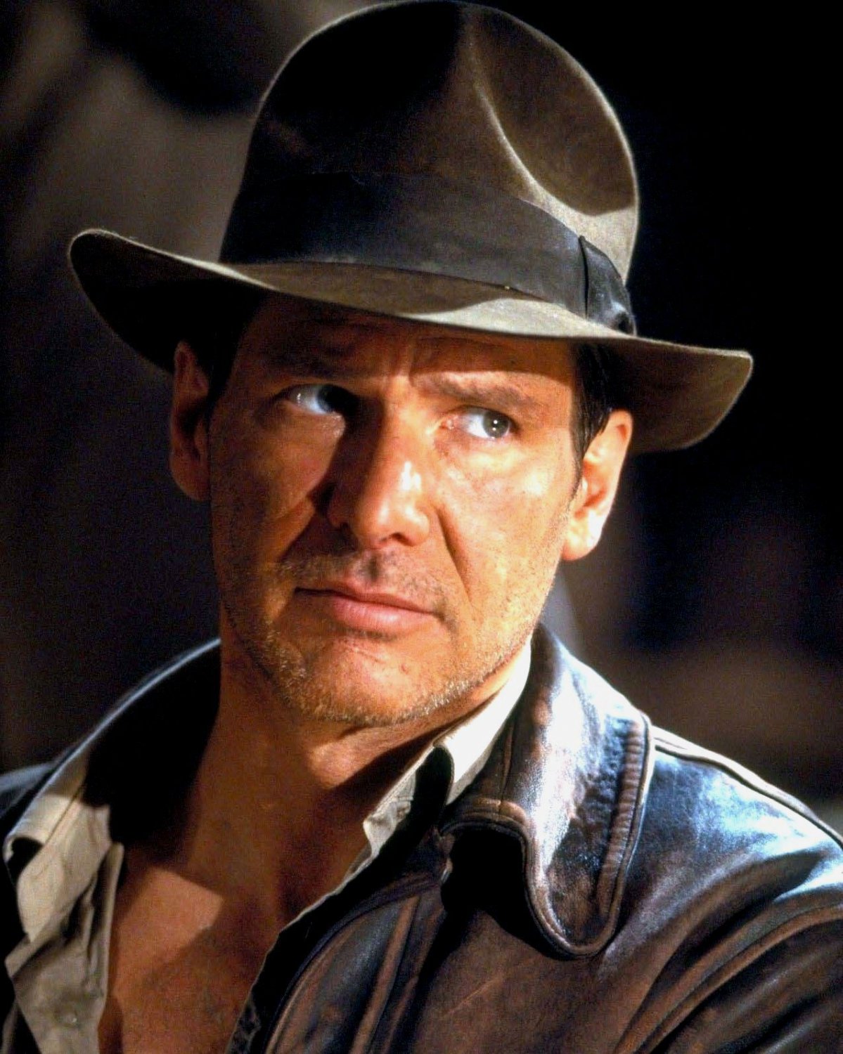 HARRISON FORD AS ICONIC CHARACTER "INDIANA JONES" 8X10 PUBLICITY PHOTO