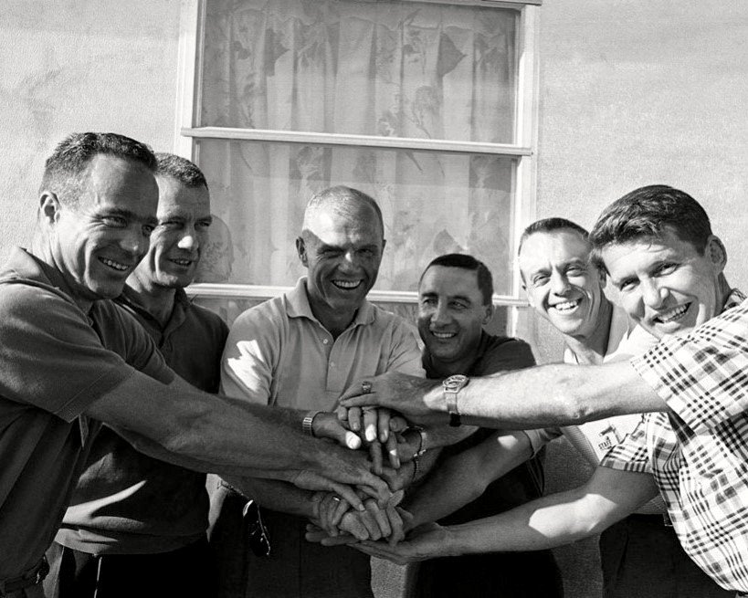 MERCURY ASTRONAUTS UNITED WITH HANDS CLASPED - 8X10 NASA PHOTO (AA-281)