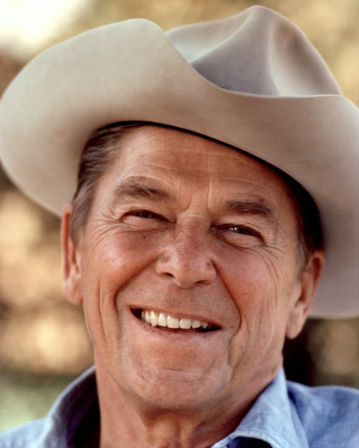 RONALD REAGAN WEARS A COWBOY HAT CIRCA 1976 (EP-419) Photo of Ronald Reagan w...