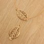 Simply Elegant Stainless Steel Gold Filigree Double Leaf Lariat Pendant Chain Necklace