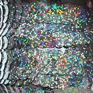 Galactic Black Hologram Reflective Sequin Trim 10mm flat strung. Made in USA.