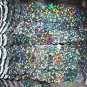 Galactic Black Hologram Reflective Sequin Trim 10mm flat strung. Made in USA.