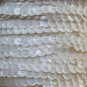Sequin Trim ~ Opaque Ivory Bone ~ 8mm Cup Facet strung by the yard. Made in USA.