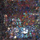 Sequin Trim Black Galaxy Hologram 8mm flat strung by the yard. Made in USA.