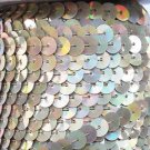 Sequin Trim Ultra Silver Lazersheen 8mm flat strung by the yard. Made in USA.