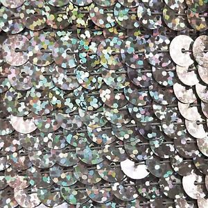 Sequin Trim Silver Ultra Hologram 8mm flat strung by the yard. Made in USA.