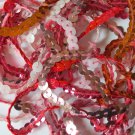 6mm Sequin Trim Sampler Pack. 10 (12") pieces. Colors: Pink Orange Red