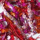 8mm Sequin Trim Sampler Pack. 10 (12") pieces. Colors: Pink Red Orange Brown