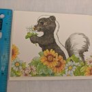 Current Inc Carefree Capers Note Card Skunk in Flowers by Ann Patrice Wilson