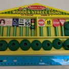 Melissa & Doug Wooden Street Signs 10 Signs & Bases Approx 3" in Tray