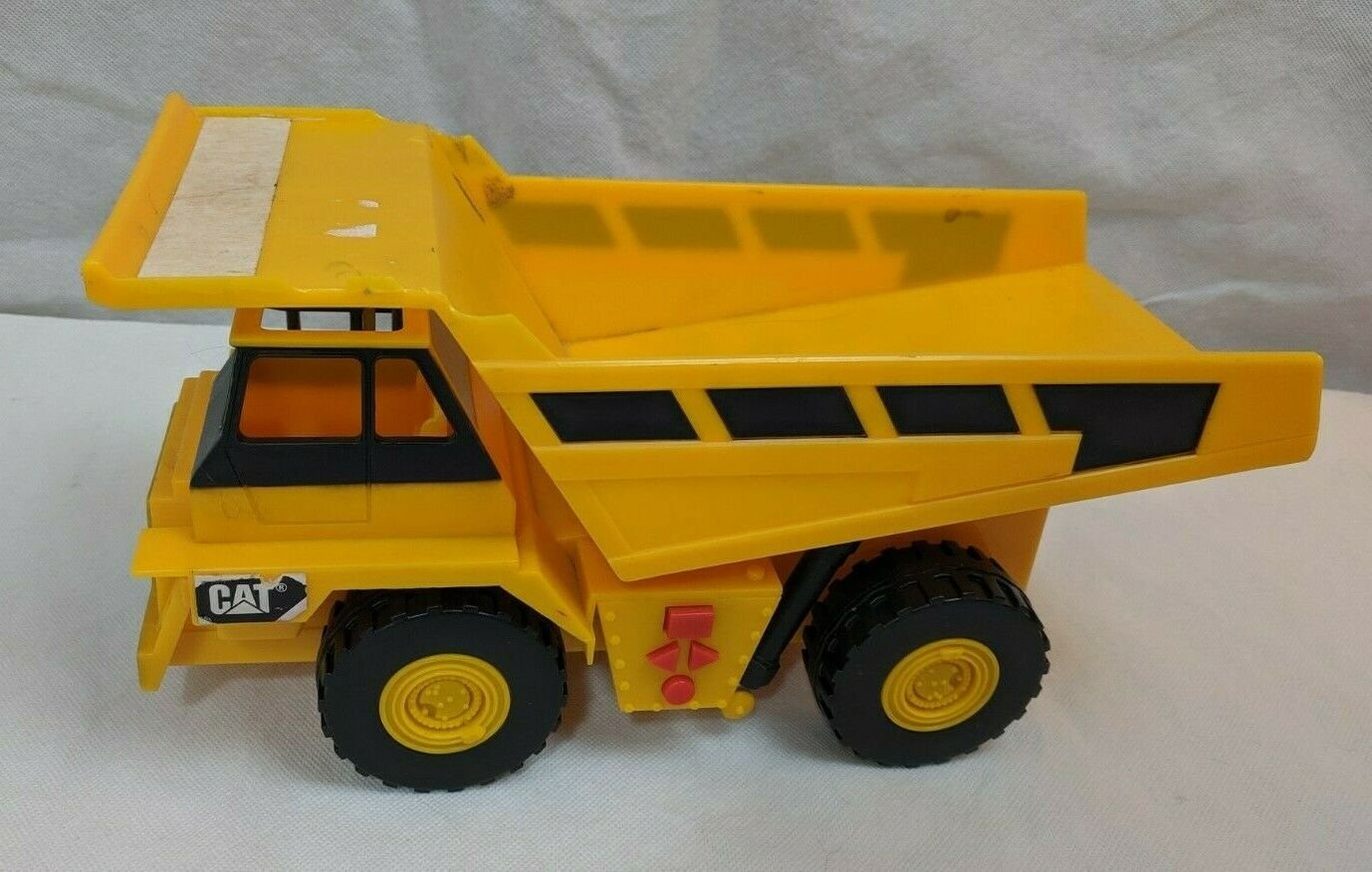 CAT Construction Dump Truck Toy Vehicle w/ Music/Sounds USED 12" Long