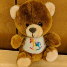 McCrory Corp Stuffed Animal Plush Bear w/ Rainbow Rocking Horse Symbol 7" Care