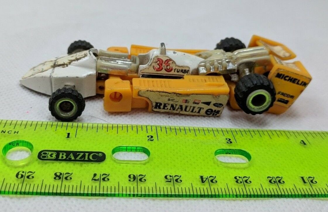 Die-Cast Metal Convertible Robot Yellow/White Formula 1 Race Car AS-IS
