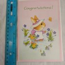 Olympia Congratulations Card Bunny in Dress & Hat In Garden