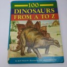 100 Dinosaurs From A to Z by Ron Wilson/Cecilia Fitzsimons *Bad Spine*