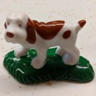 White/Brown Hound Dog on Grass 1.25" Tall Plastic Figurine Toy
