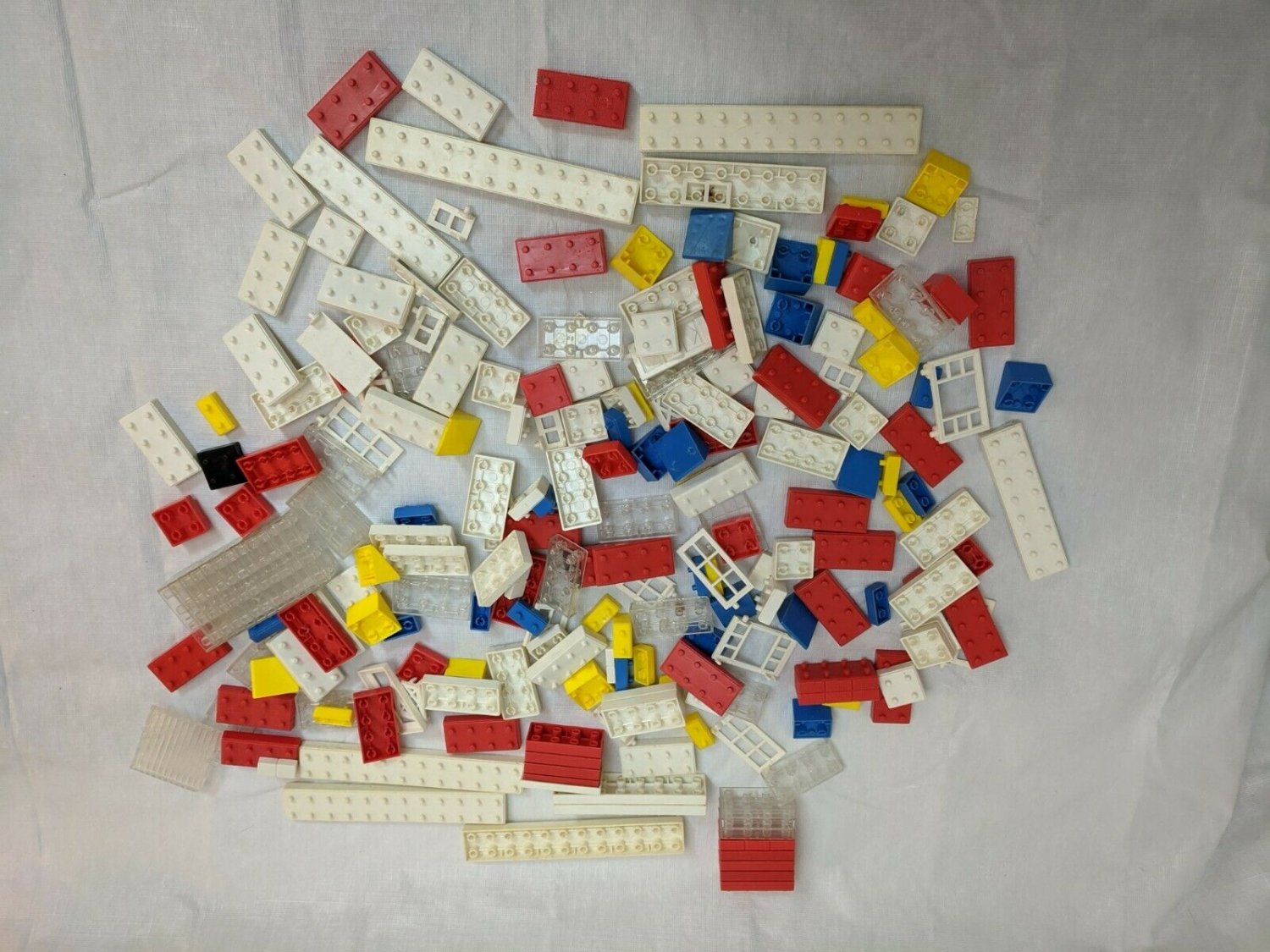 American Bricks & Unmarked Interlocked Brick Toys White/Red/Blue/Yellow