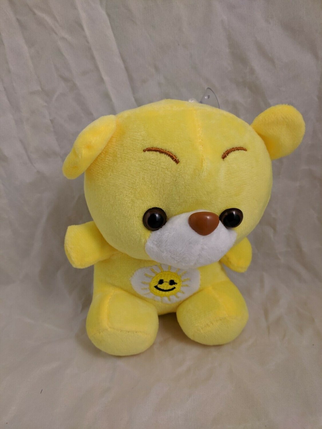 Yellow Teddy Bear Plush w/ Sun Rays Tummy Symbol 7" Tall Cute Stuffed Animal