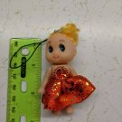 Mini Confused Girl Keychain Doll 3" Tall Yellow Hair, Red/Rainbow Foil Skirt