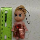 Mini Confused Girl Keychain Doll 3" Tall Curly Hair, Red/Gold Foil Skirt