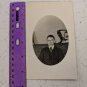 RPPC Old Picture Oval Shaped: Man Sitting on Brocade Couch, Pillow Behind