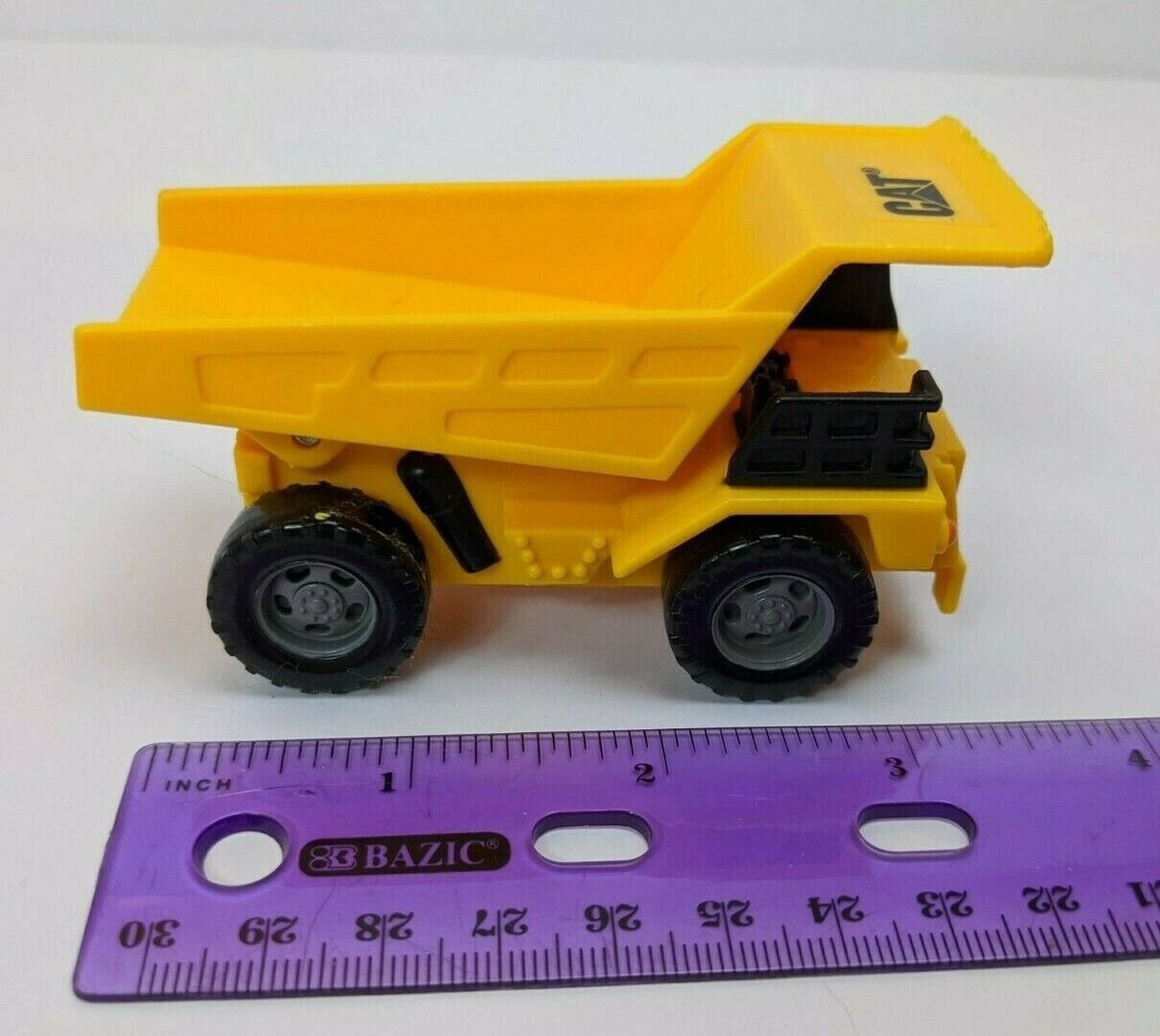 Yellow CAT Dump Truck Plastic Toy w/ Raising Bed 3.5" Long *played with*
