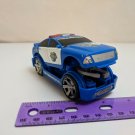Matchbox 2004 Blue Police Car Plastic 4.5" Long w/ Extending Claw