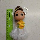 Confused Little Girl Keychain Doll 4.5" Tall Curly Brunette White Dress Yellow