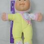 Cabbage Patch Kids CPK Baby Girl Doll w/ Yellow Sleeper Green Eyes 2009