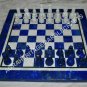 Lapis chess table with black and white chess coins