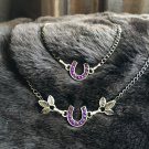 Purple and silver tone horseshoe necklace and bracelet set