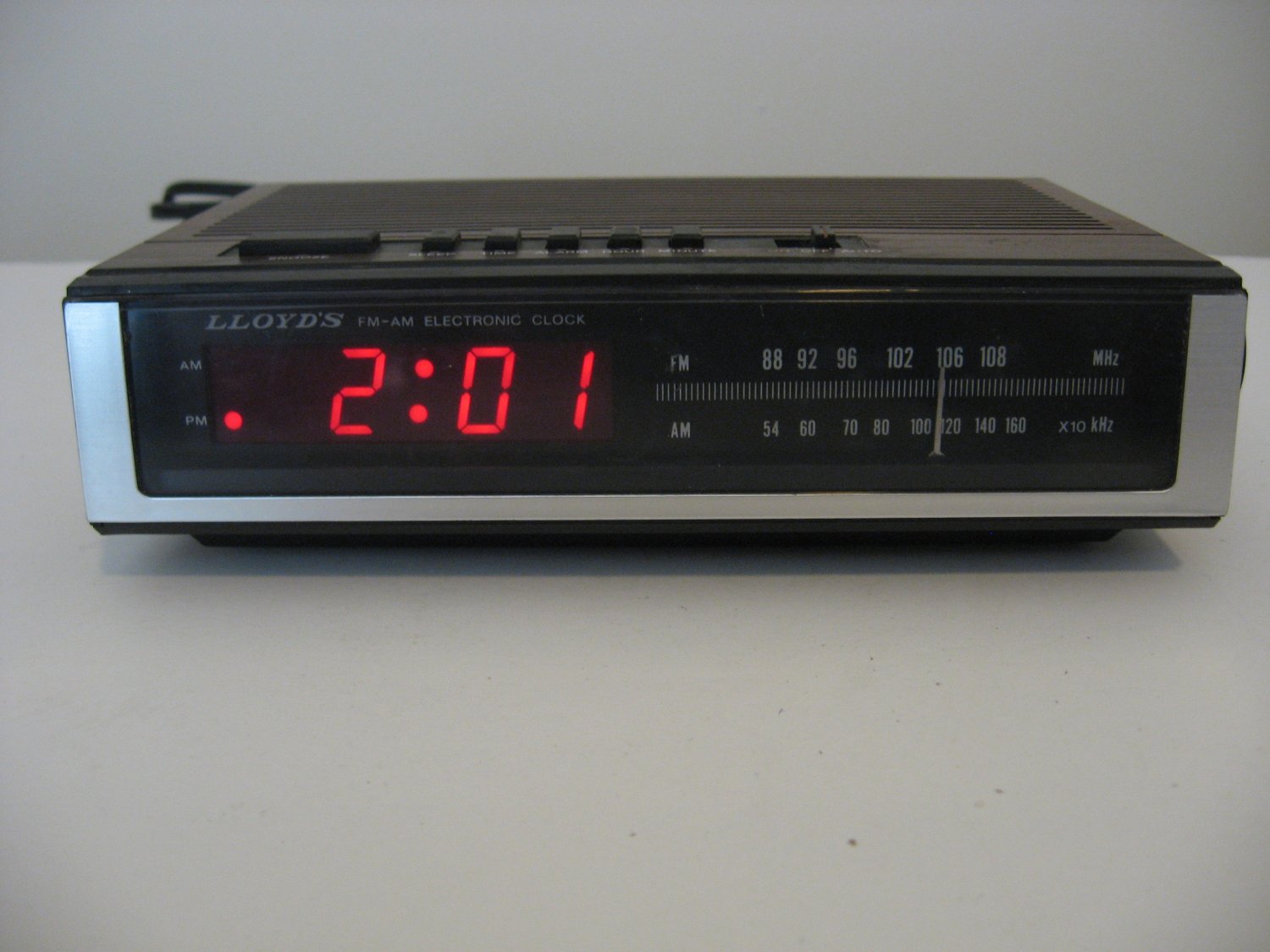 Vintage 1970's Lloyd’s Digital Clock Radio Faux Wood Grain
