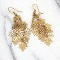 Gold long small leaf earrings