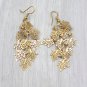 Gold long small leaf earrings