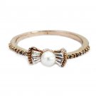 Gold delicate bow pearl crystal ring