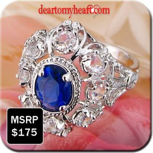 Oval Cut Blue September Sapphire Ladies Ring Layered in 18K White Gold