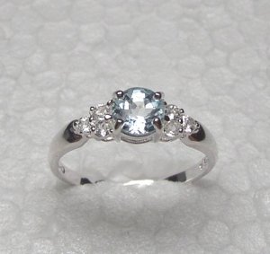 Sterling silver ring with BLUE and  WHITE TOPAZ stones size 7