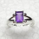 Sterling silver ring with an Emerald cut Amethyst Stone in size 6
