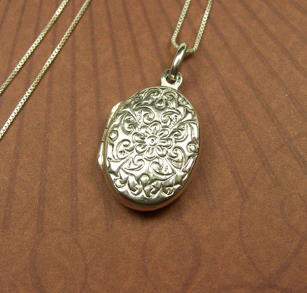 Sterling silver Oval locket with a floral design and chain necklace