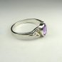 Sterling silver ring with an Oval Amethyst Stone and Celtic Trinity knot design in size 6