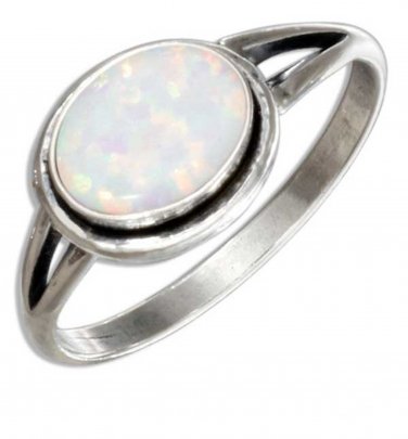 Sterling silver ring with a lab created Oval White Opal Stone in size 8