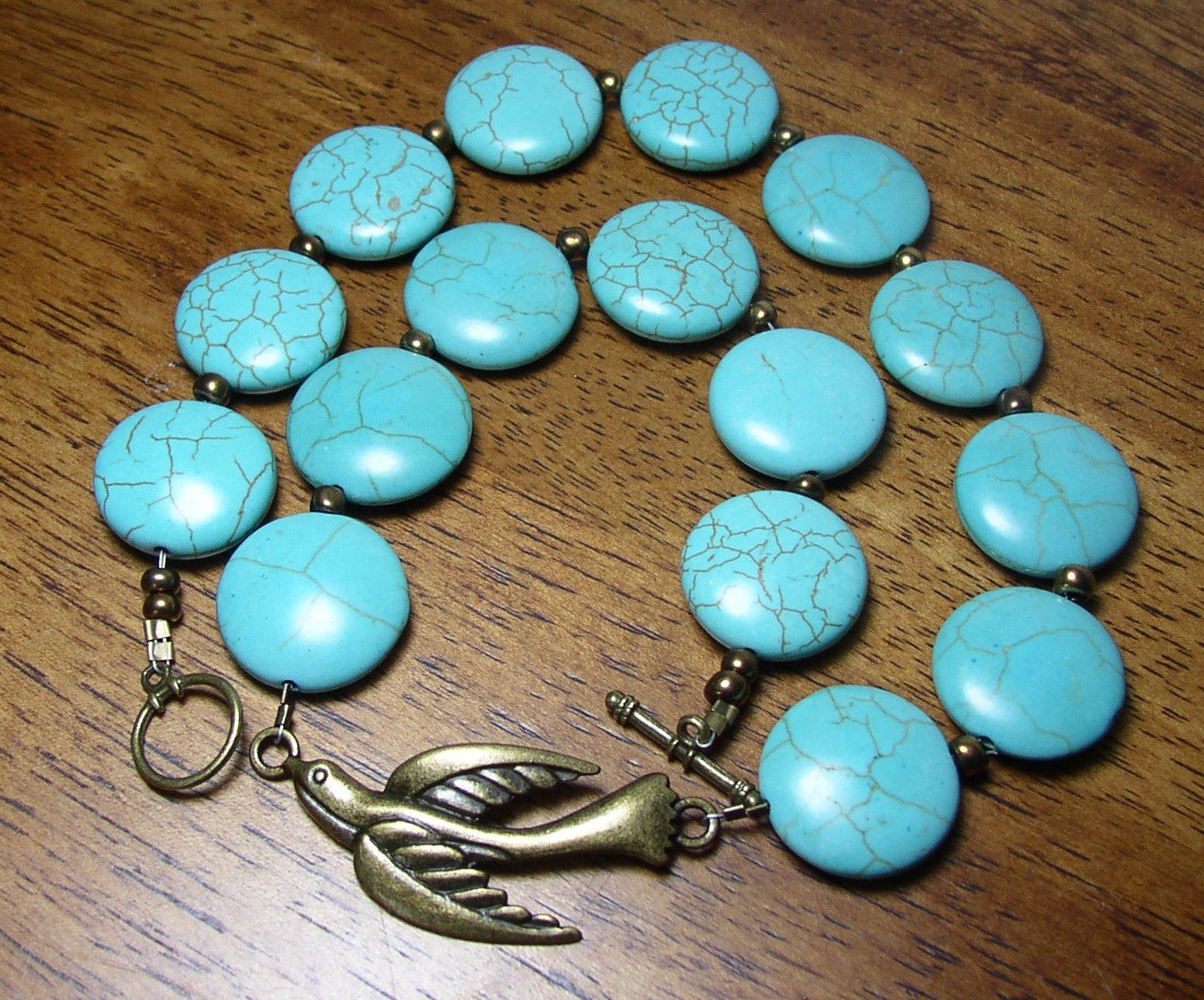 Turquoise Magnesite stone and brass bird 18 inch Necklace