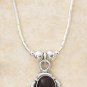 Sterling Silver beaded necklace with a genuine Garnet Pendant