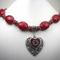 Dark Red beaded necklace and matching earrings with two heart pendants