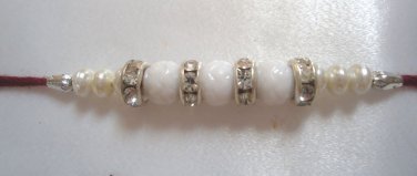 White Moti With Natural Pearls & Crystals Rakhi by Teknowear